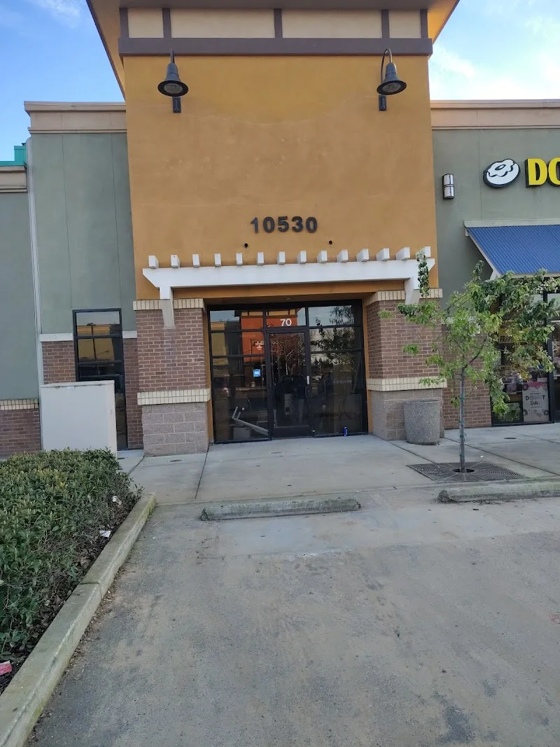 Wingstop food and storefront view at 10530 Twin Cities Rd 70 in Galt, California