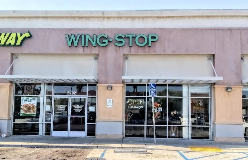 Wingstop food and storefront view at 6792 Cherry Ave in Long Beach, California