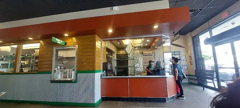 Wingstop food and storefront view at 10007 S. Central Ave in Los Angeles, California