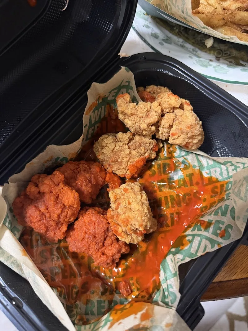 Wingstop food and storefront view at 1160 Arnold Dr F in Martinez, California