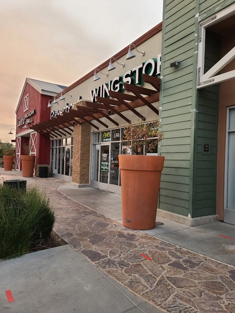 Wingstop food and storefront view at 30024 Haun Rd in Menifee, California