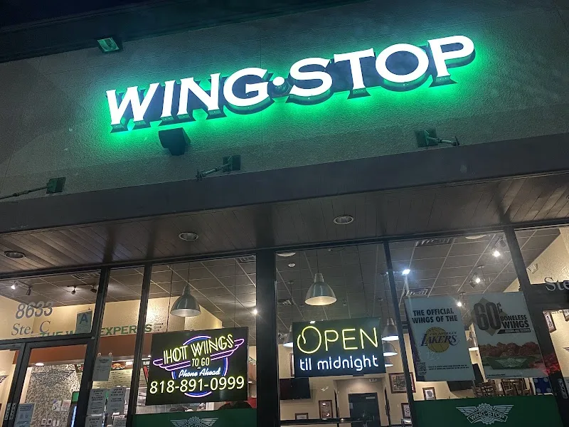 Wingstop food and storefront view at 8633 Woodley Avenue in North Hills, California
