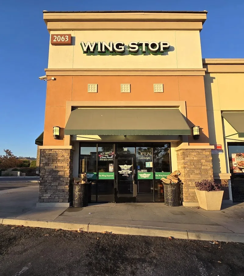 Wingstop food and storefront view at 2063 Rancho Valley Dr Ste 300 in Pomona, California