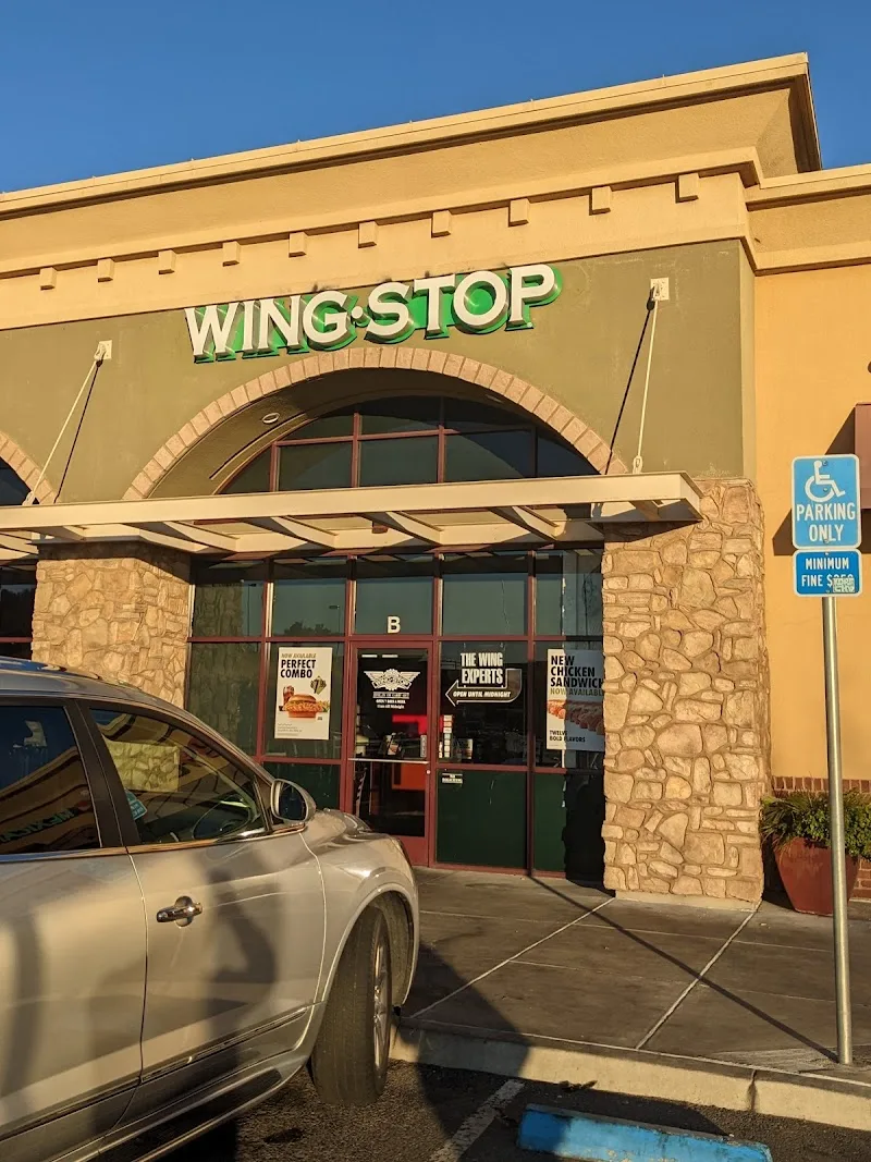 Wingstop food and storefront view at 2251 Claribel Rd Ste B in Riverbank, California