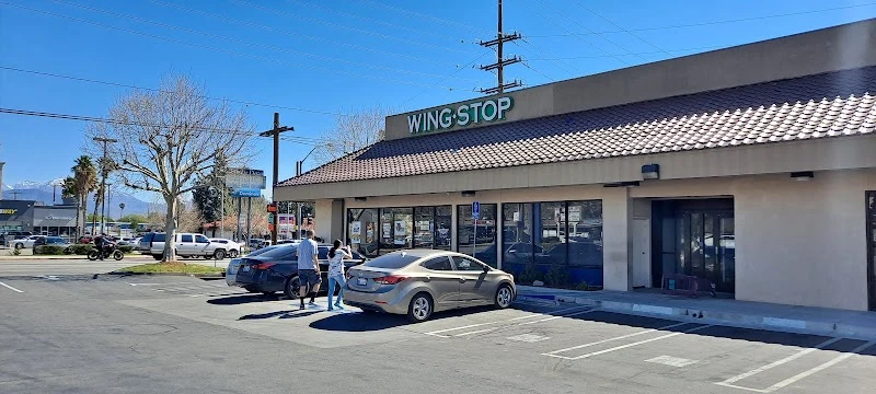 Wingstop food and storefront view at 1598 E. Highland Ave in San Bernardino, California