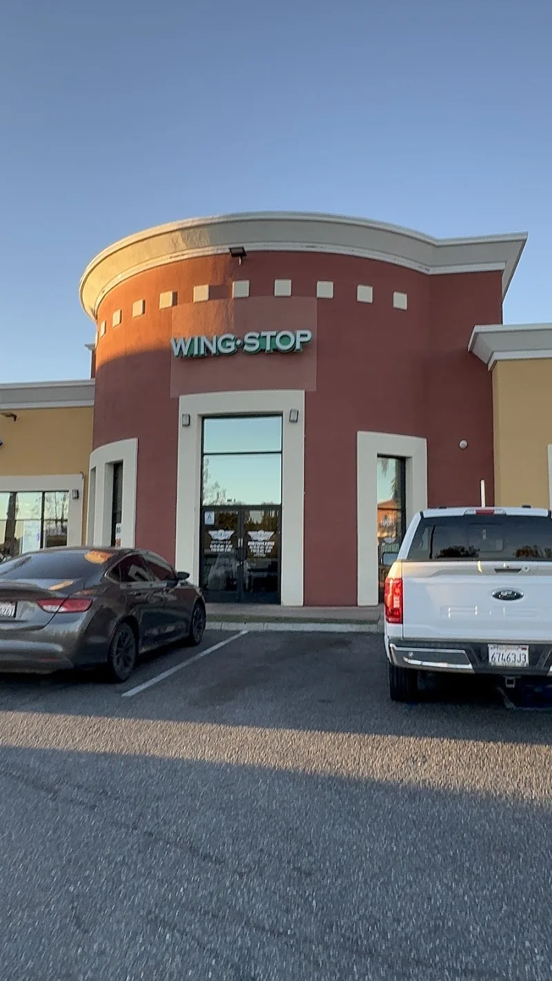 Wingstop food and storefront view at 5244 University Parkway Unit H in San Bernardino, California