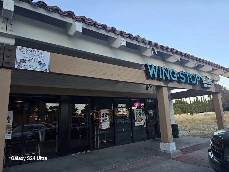 Wingstop food and storefront view at 5052 West Ln in Stockton, California