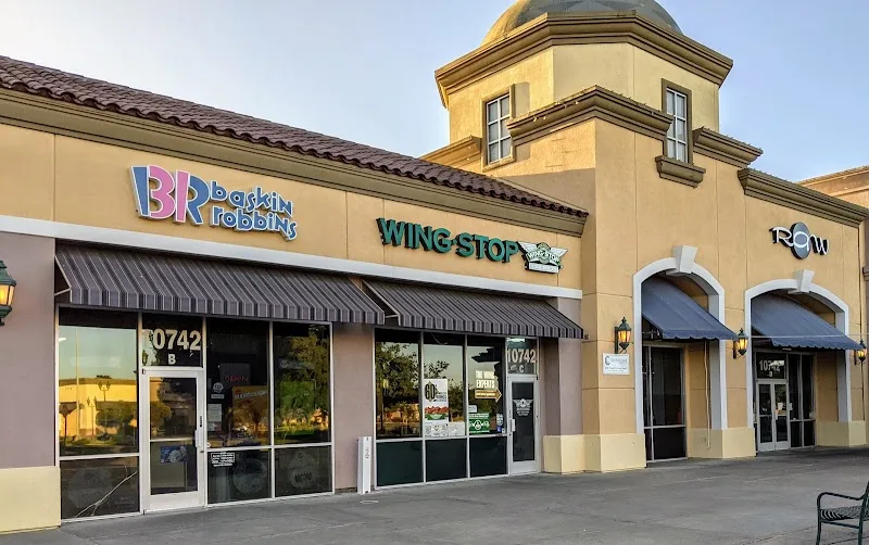 Wingstop food and storefront view at 10742 Trinity Pkwy Ste C in Stockton, California