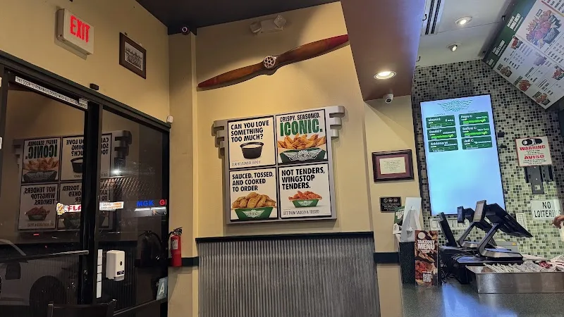 Wingstop food and storefront view at 6102 Reseda Blvd in Tarzana, California