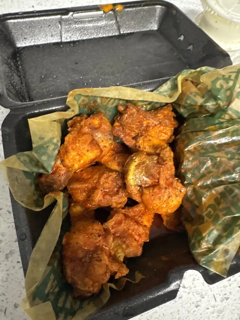 Wingstop food and storefront view at 18911 S Tamiami Trail Suite 6 in Fort Myers, Florida