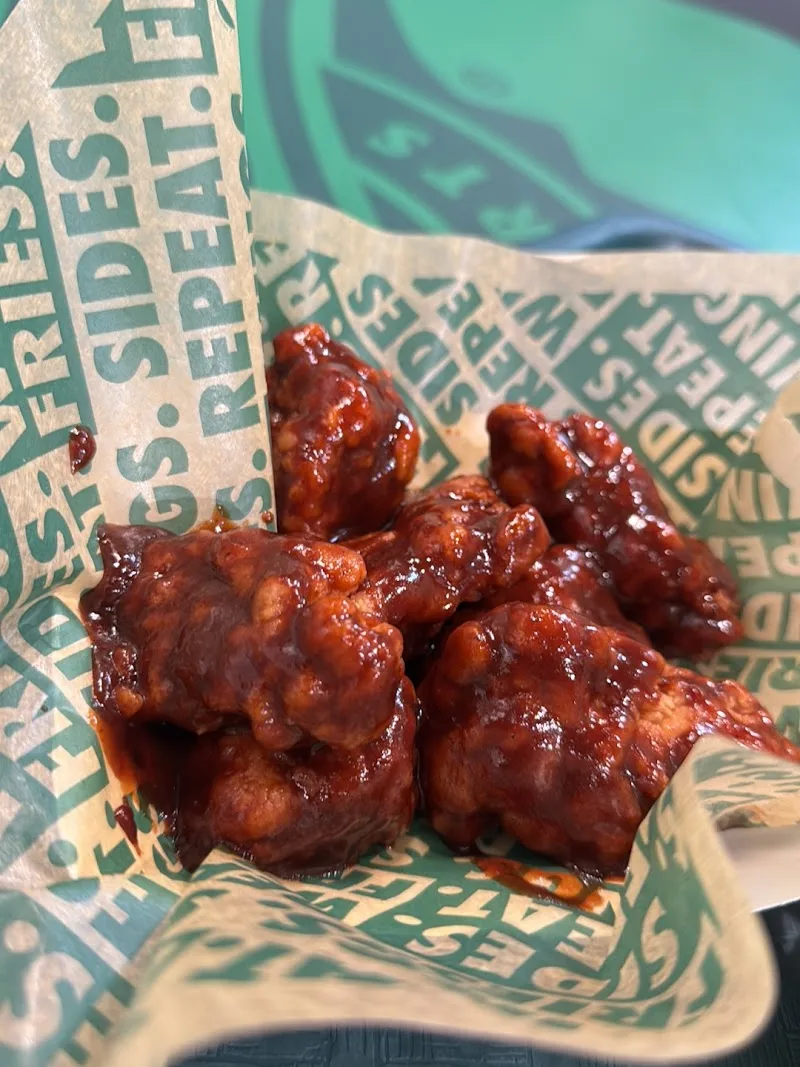Wingstop food and storefront view at 10961 SW 40th St in Miami, Florida