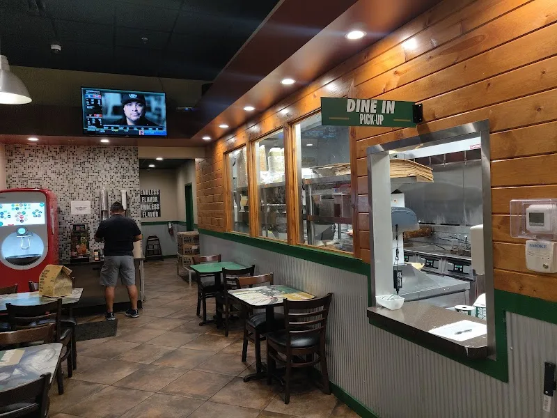 Wingstop food and storefront view at 8956 Turkey Lake Rd #300 in Orlando, Florida