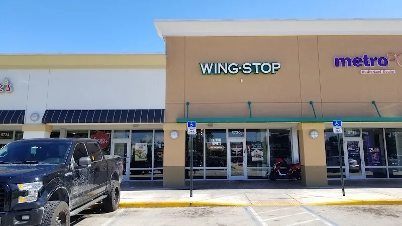 Wingstop food and storefront view at 5720 North University Drive in Tamarac, Florida