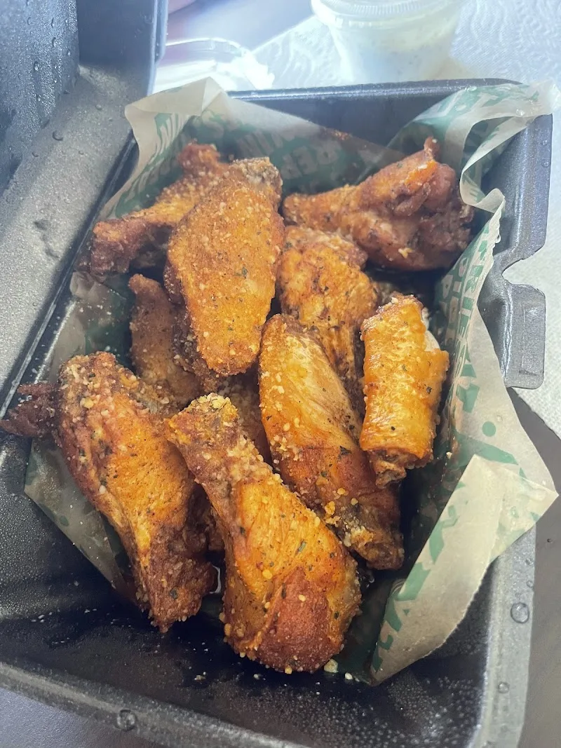 Wingstop food and storefront view at 595 Piedmont Ave Ne Ste 330 in Atlanta, Georgia