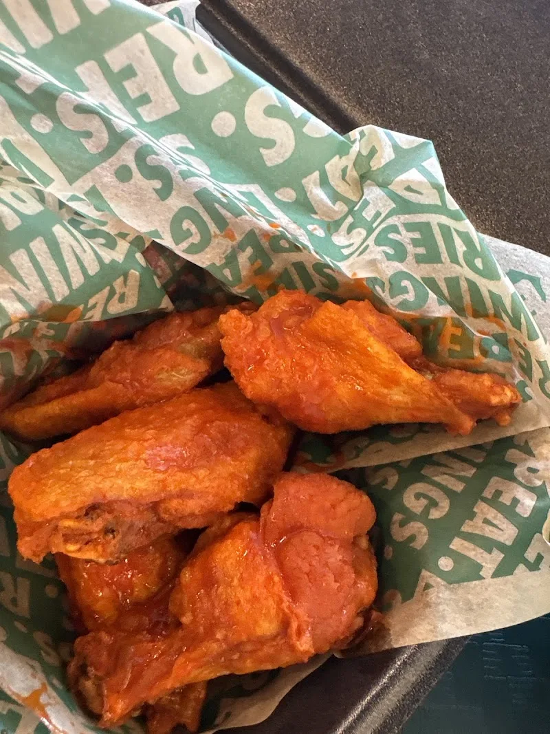 Wingstop food and storefront view at 6361 Talokas Lane Ste. D-210B in Columbus, Georgia