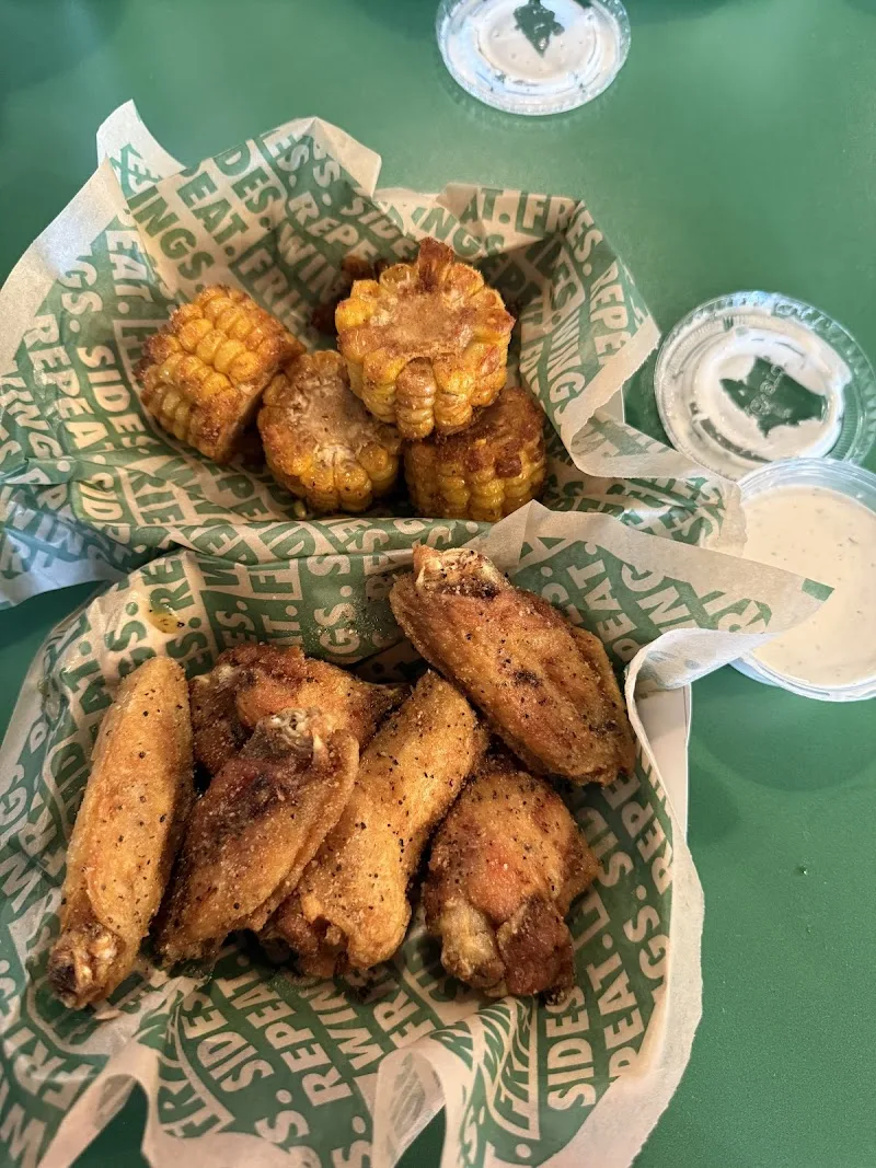 Wingstop food and storefront view at 100 W. Walnut Ave in Dalton, Georgia