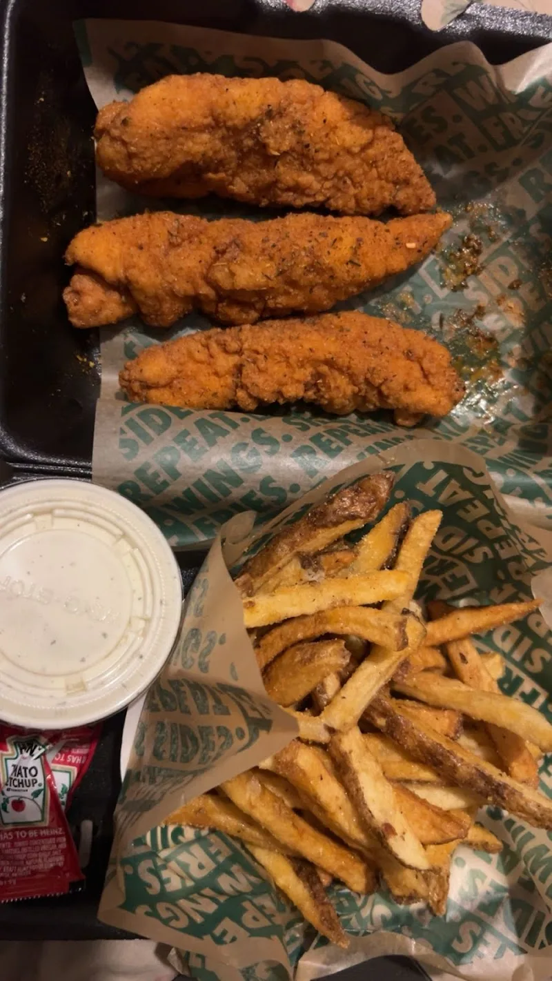 Wingstop food and storefront view at 1351 Boone Ave in Kingsland, Georgia
