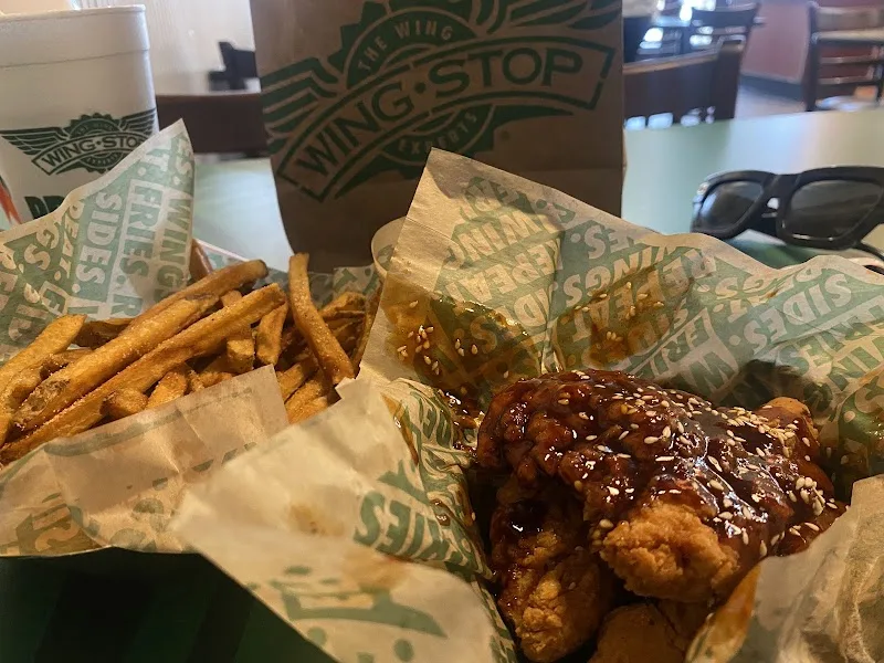Wingstop food and storefront view at 12 E Harrison St in Chicago, Illinois