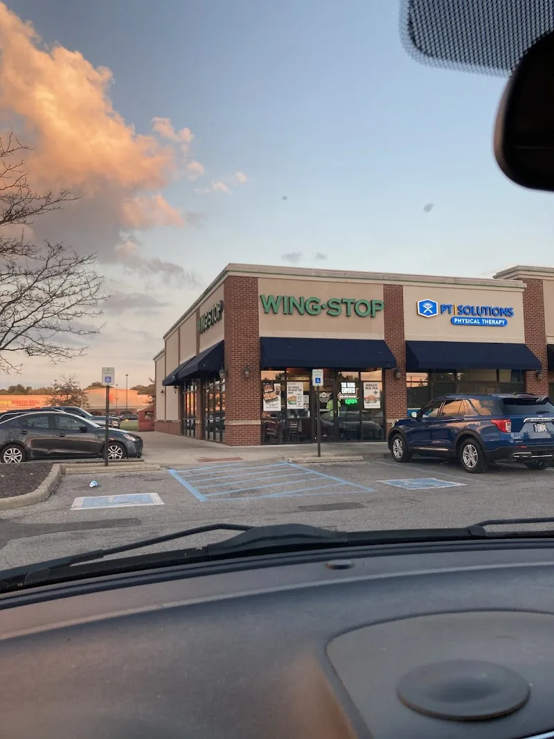 Wingstop food and storefront view at 7711 Shelby St Ste A in Indianapolis, Indiana