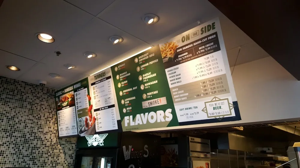 Wingstop food and storefront view at 2007 S Hurstbourne Pkwy in Louisville, Kentucky