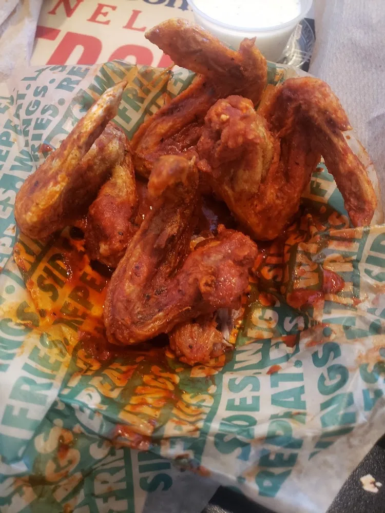 Wingstop food and storefront view at 4812 Dixie Hwy in Louisville, Kentucky