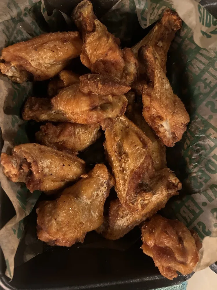 Wingstop food and storefront view at 1712 SW Railroad Ave in Hammond, Louisiana
