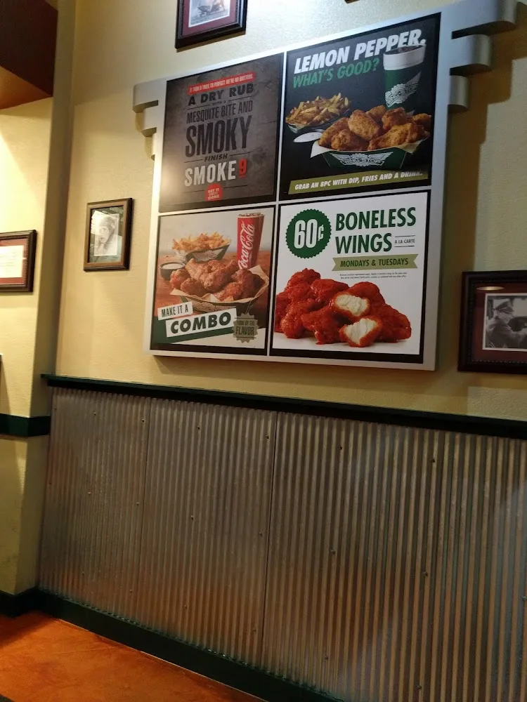 Wingstop food and storefront view at 651 Terry Pkwy Ste 112 in Gretna, Louisiana