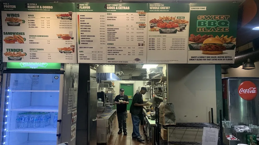 Wingstop food and storefront view at 2950 Ryan St Ste B in Lake Charles, Louisiana