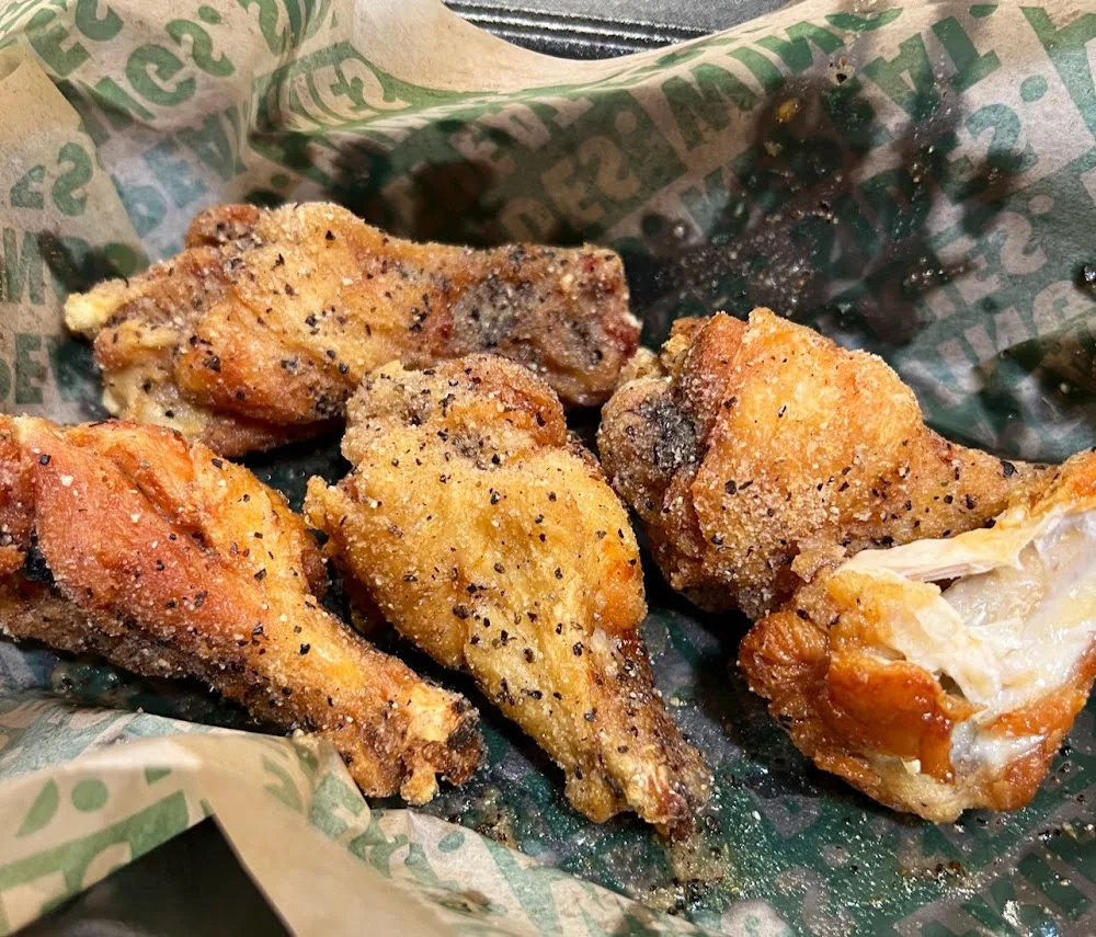 Wingstop food and storefront view at 7089 Siegen Lane in Baton Rouge, Louisiana