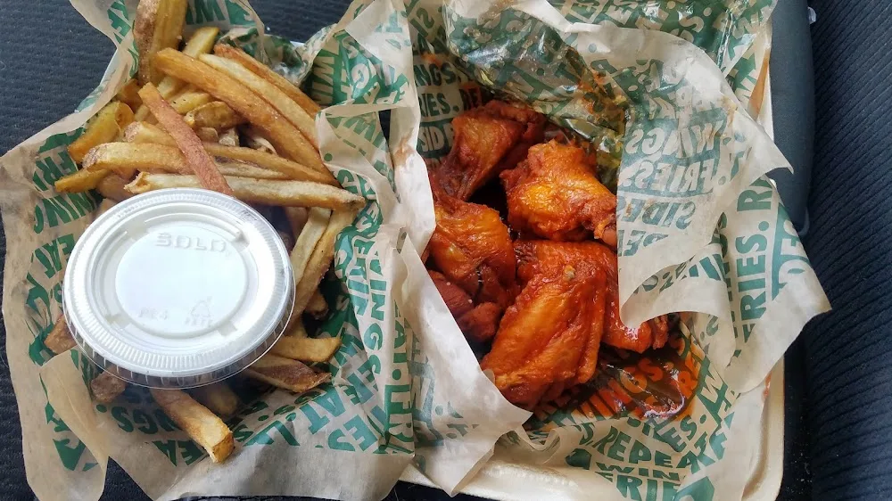 Wingstop food and storefront view at 3034 S Sherwood Forest Blvd Ste 1B in Baton Rouge, Louisiana