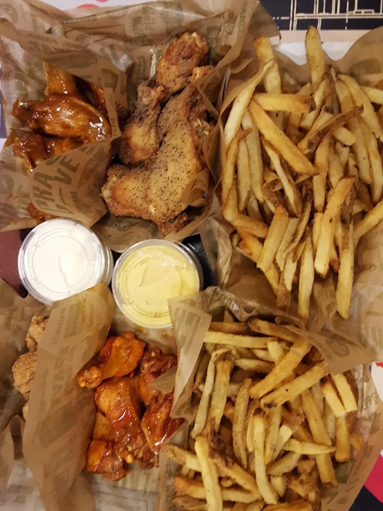 Wingstop food and storefront view at 500 Corporate Dr Ste L in Houma, Louisiana