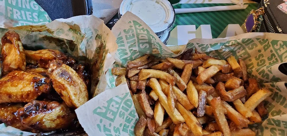 Wingstop food and storefront view at 21 Torrey St. Ste 15A in Brockton, Massachusetts