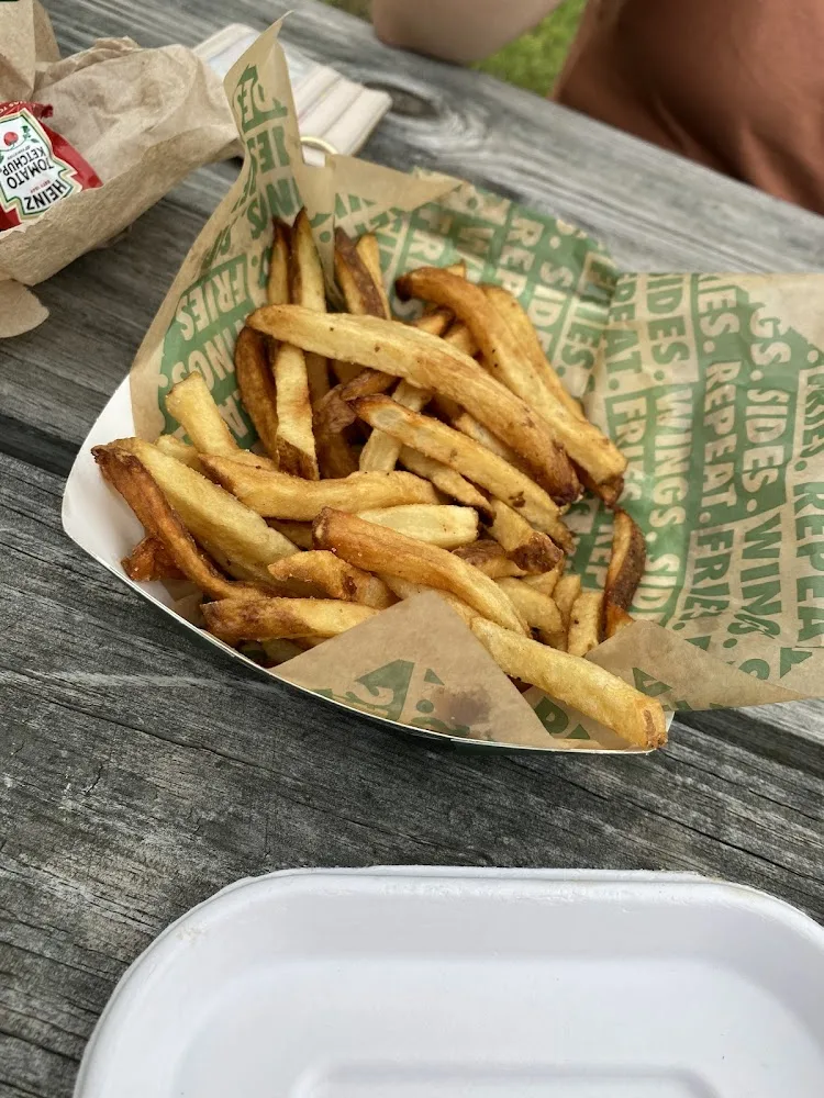 Wingstop food and storefront view at 817 Maiden Choice Lane in Catonsville, Maryland