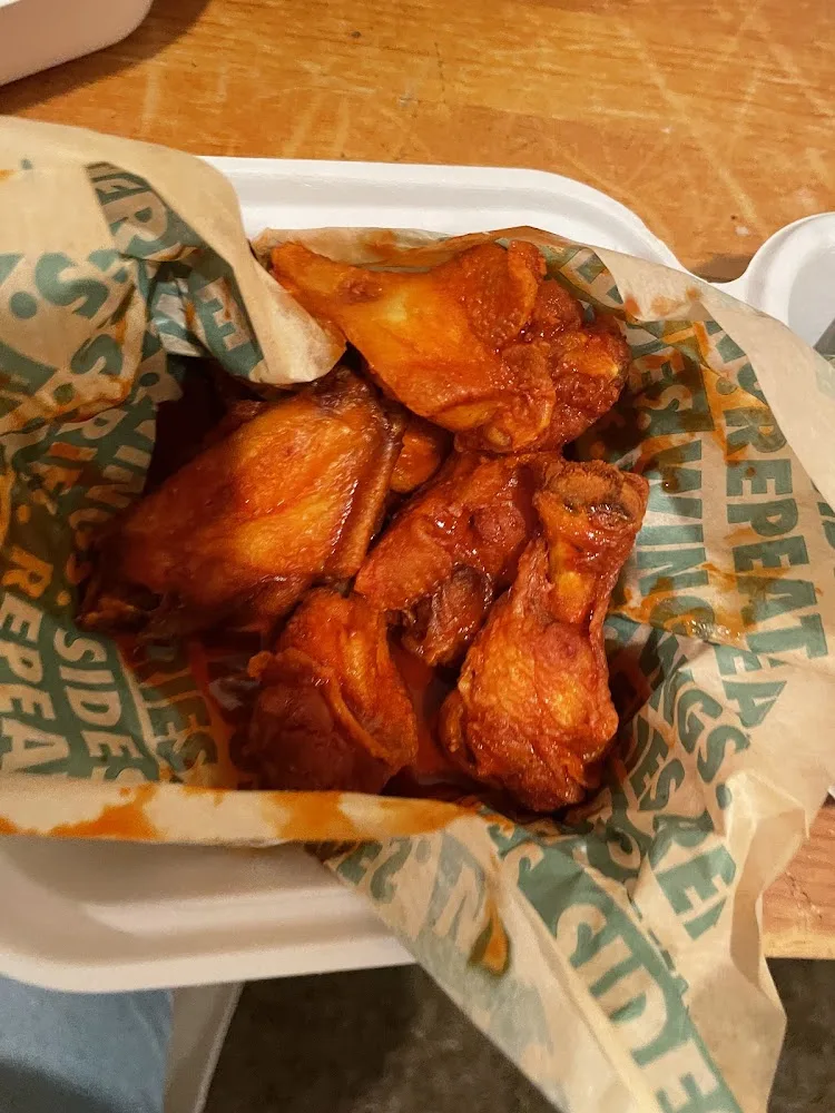 Wingstop food and storefront view at 7659 New Hampshire Ave in Takoma Park, Maryland