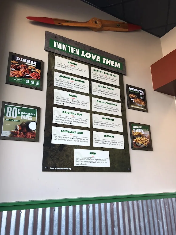 Wingstop food and storefront view at 1331 Eight Mile Rd in Detroit, Michigan
