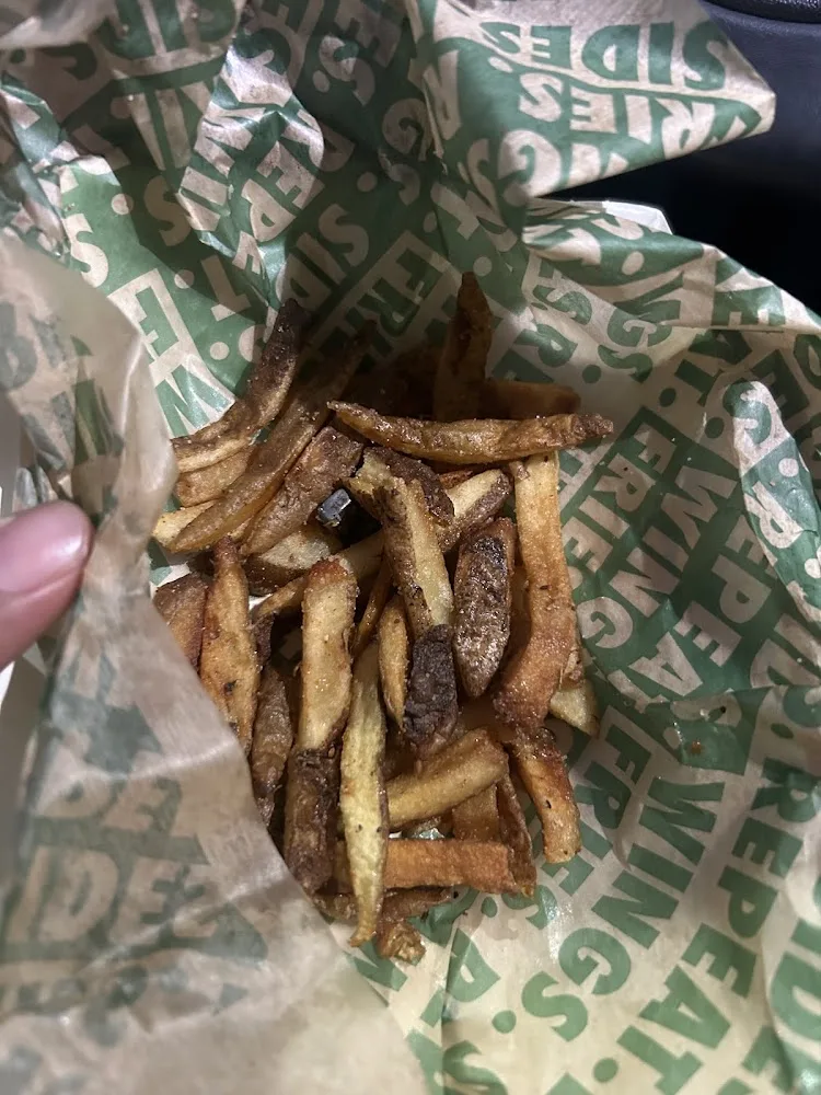 Wingstop food and storefront view at 28517 Schoolcraft Rd Ste A-110 in Livonia, Michigan