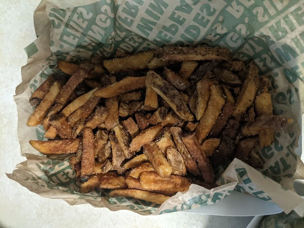 Wingstop food and storefront view at 12459 23 Mile Road in Shelby Township, Michigan