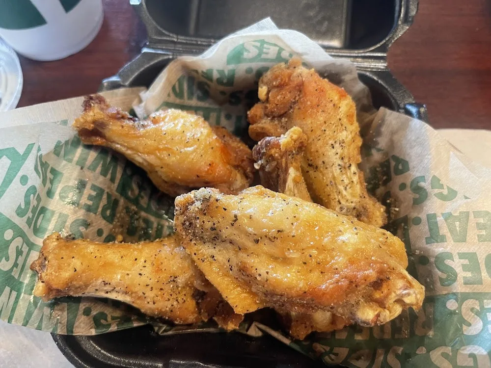 Wingstop food and storefront view at 31042 Gratiot AVE in Roseville, Michigan