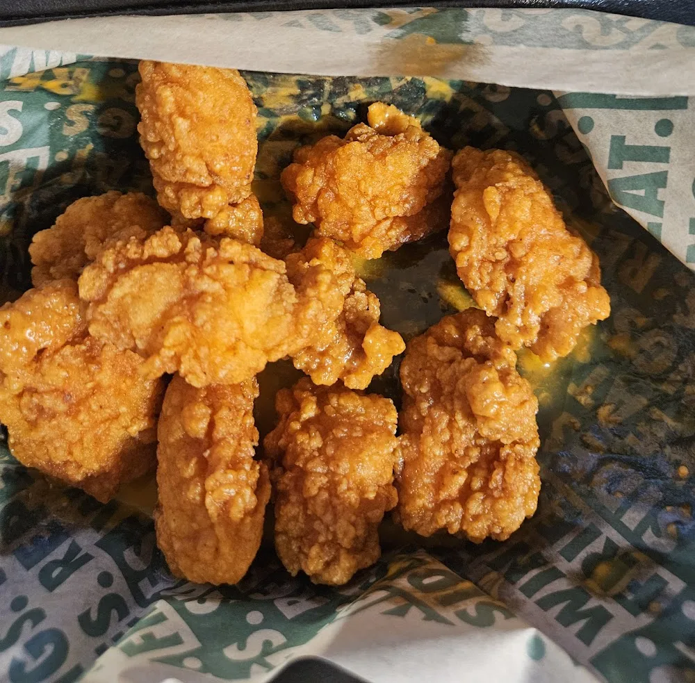Wingstop food and storefront view at 4535 Bay Rd in Saginaw, Michigan