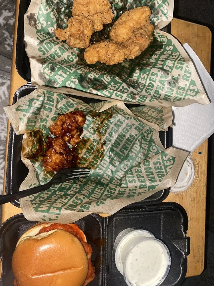 Wingstop food and storefront view at 9578 Belleville Rd in Van Buren Charter Township, Michigan
