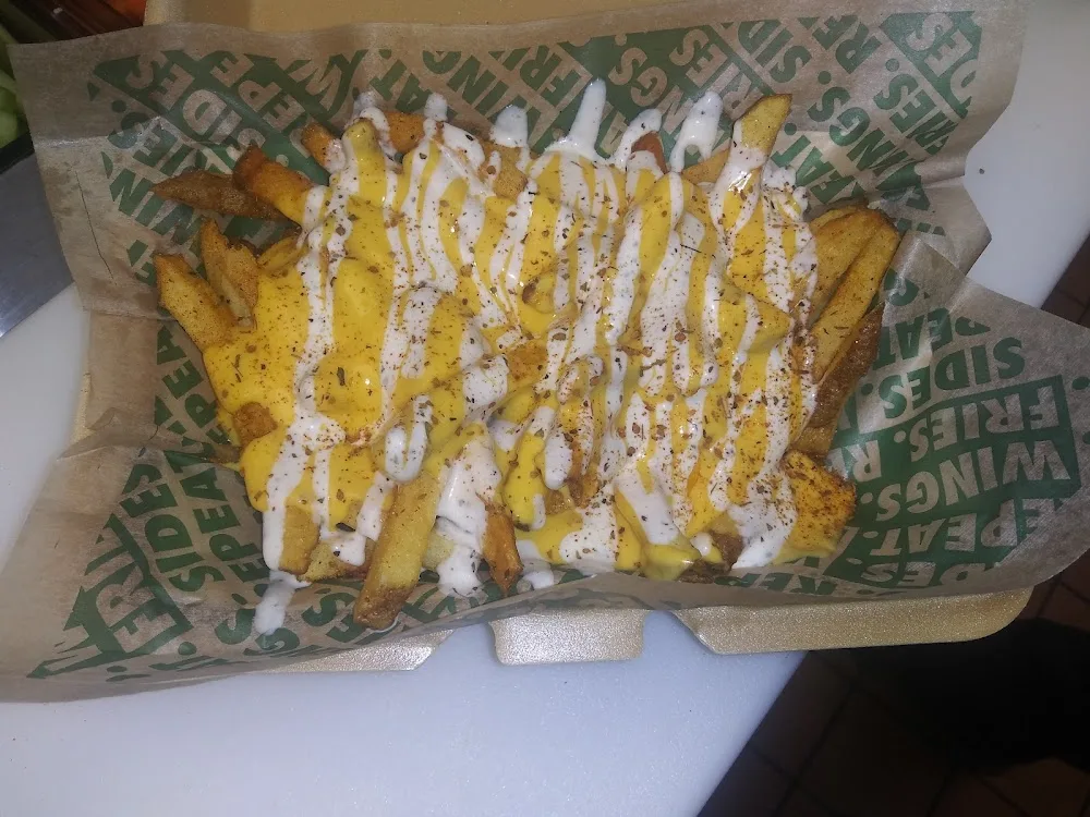 Wingstop food and storefront view at 23108 Allen Rd in Woodhaven, Michigan