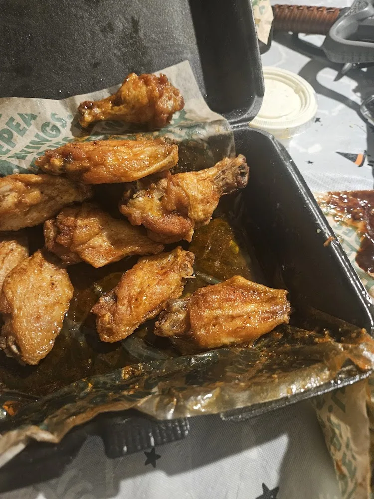 Wingstop food and storefront view at 26651 Hoover Rd in Warren, Michigan
