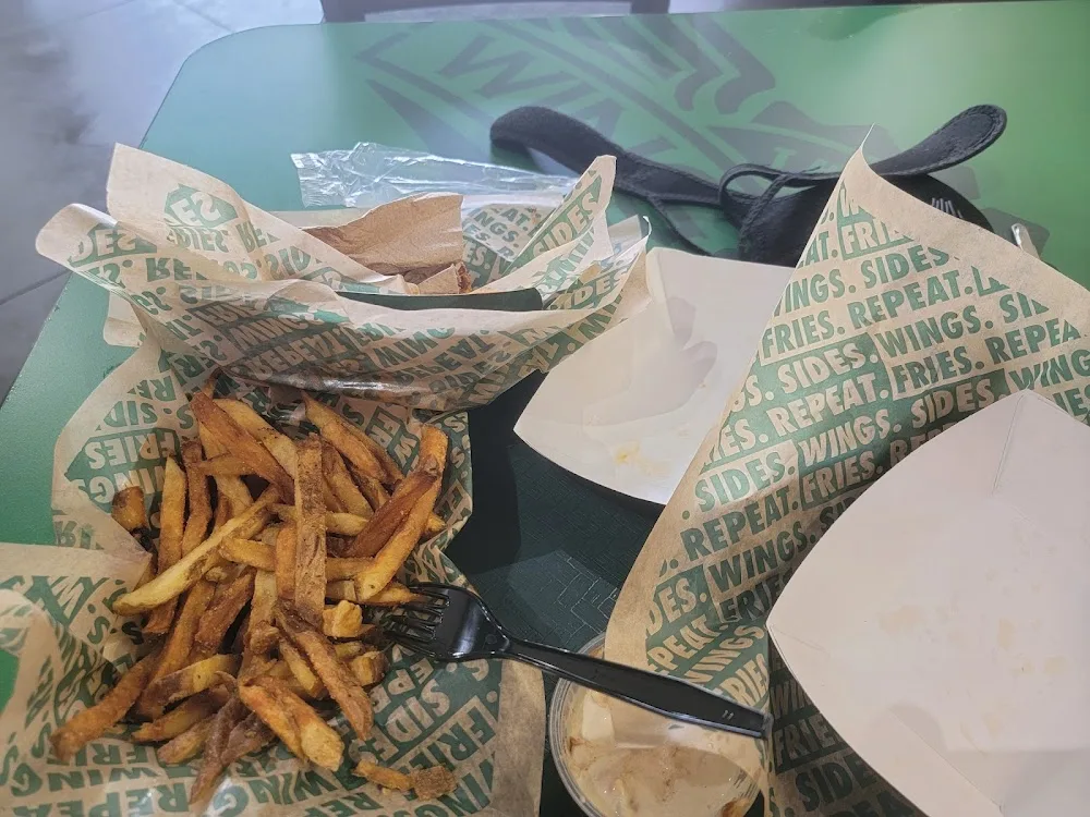 Wingstop food and storefront view at 481 NE Coronado in Blue Springs, Missouri