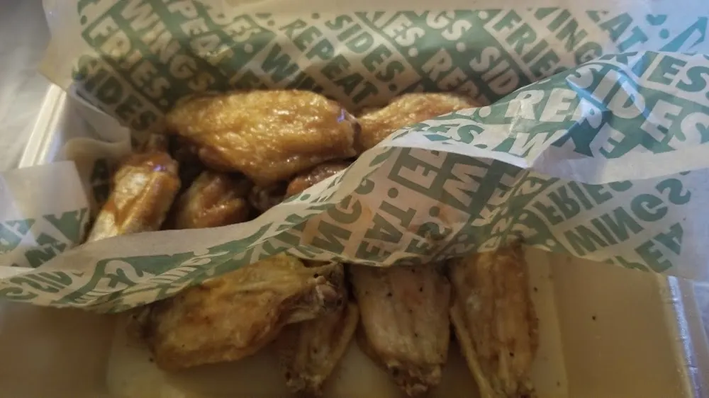 Wingstop food and storefront view at 481 NE Coronado in Blue Springs, Missouri