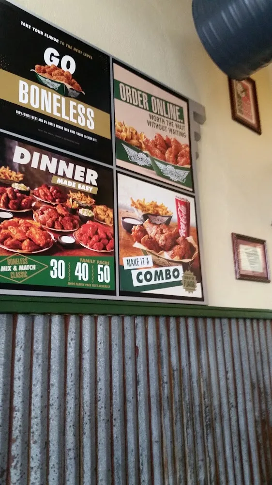 Wingstop food and storefront view at 10841 W Florissant Ave in Ferguson, Missouri