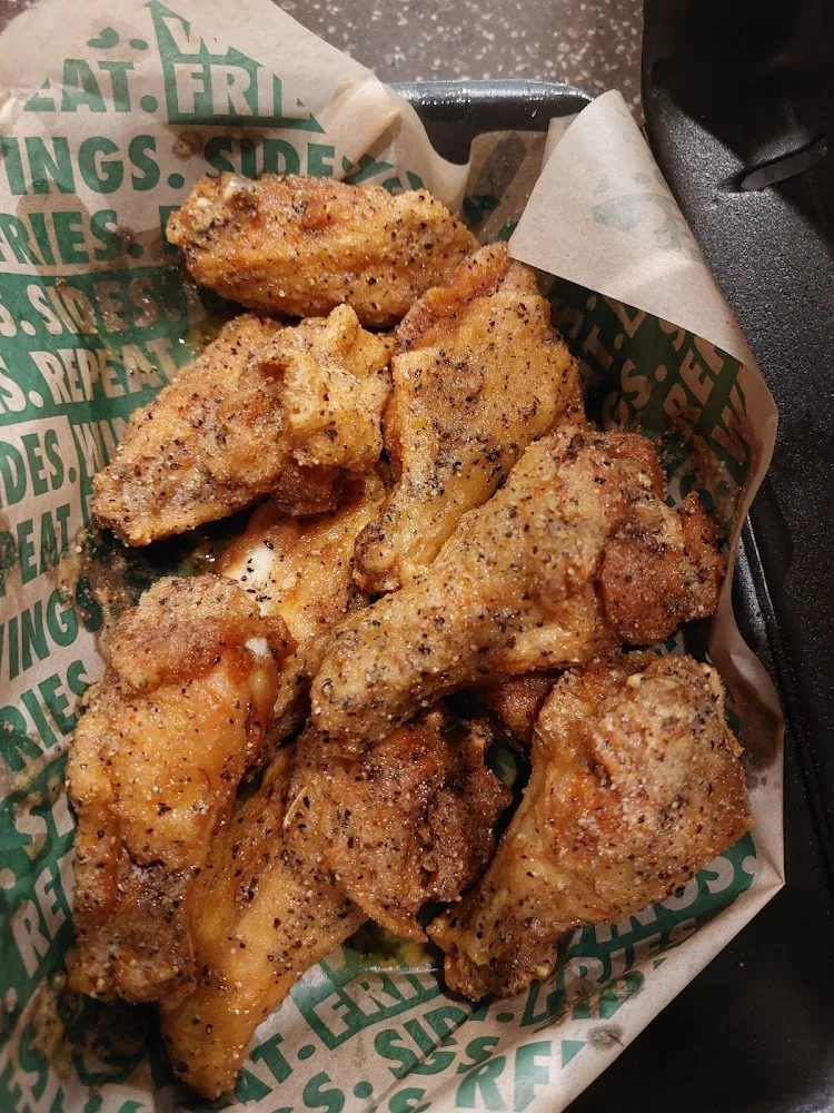 Wingstop food and storefront view at 12294 ST. Charles Rock Rd in Bridgeton, Missouri