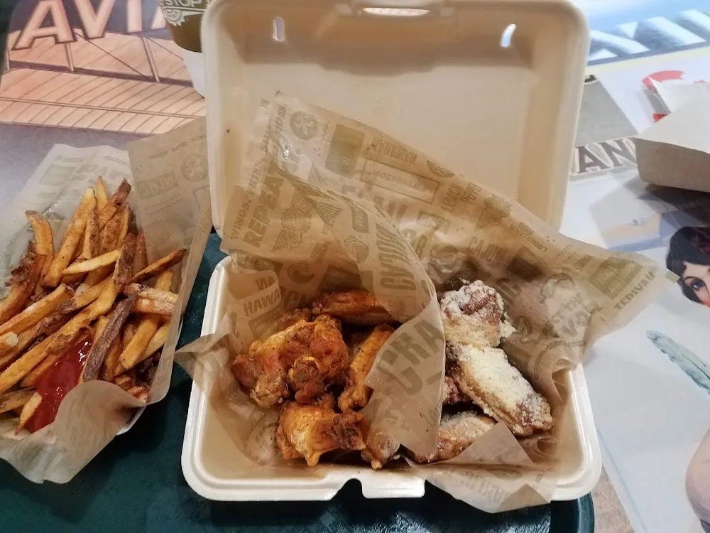 Wingstop food and storefront view at 11825 East 40 Hwy in Independence, Missouri