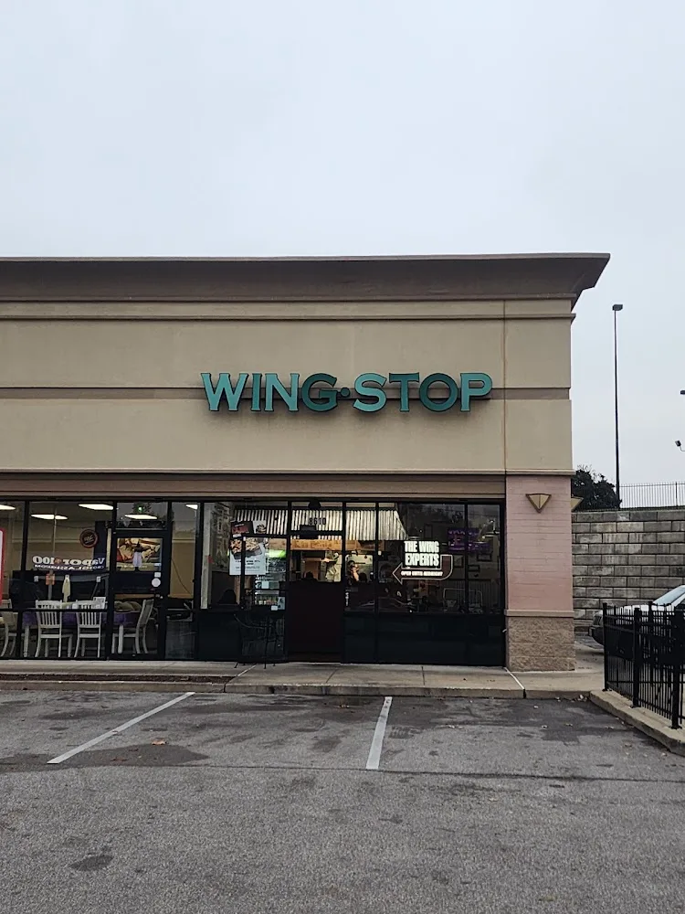 Wingstop food and storefront view at 8610 Mexico Rd in Ofallon, Missouri