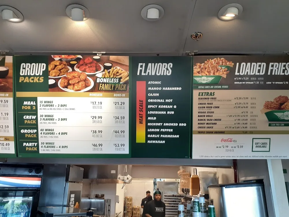 Wingstop food and storefront view at 3626 S Grand Blvd in Saint Louis, Missouri