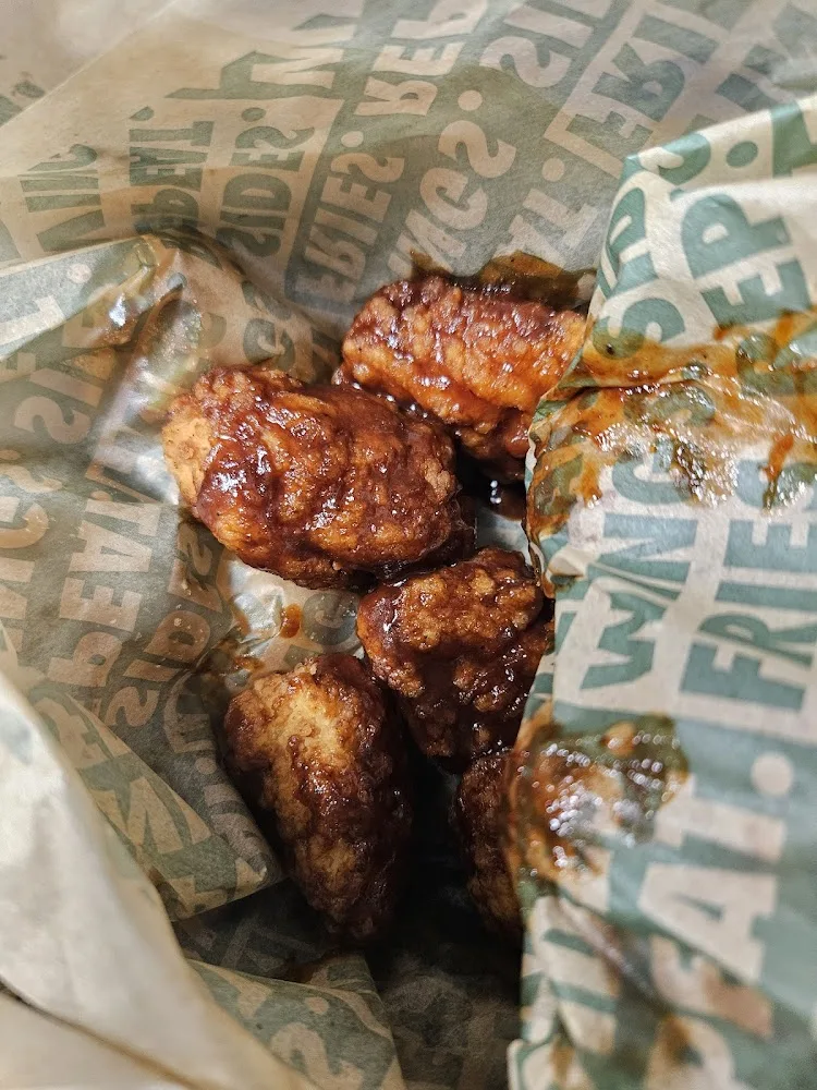 Wingstop food and storefront view at 8057 Watson Road in Webster Groves, Missouri